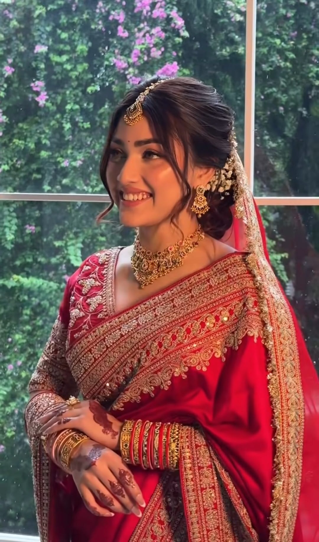 Bride with the complete look: hair, eyes, skin, lips, jewellery and draping
